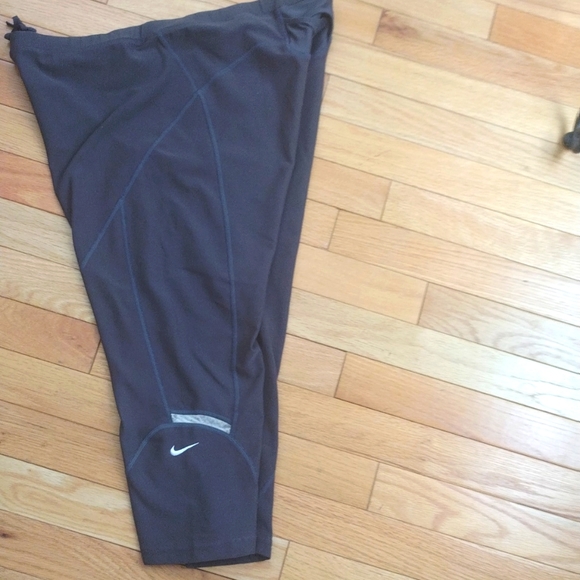 Nike Pants - - Nike gray back mesh pocket elastic pull string waist capri length leggin…